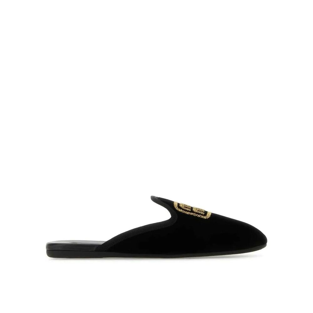 Schwarze Ledermules mit gesticktem Logo