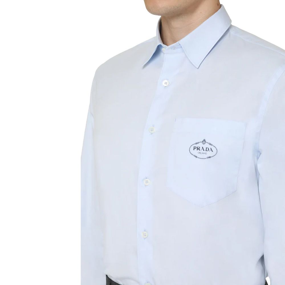 Blaues Baumwollhemd mit gesticktem Logo