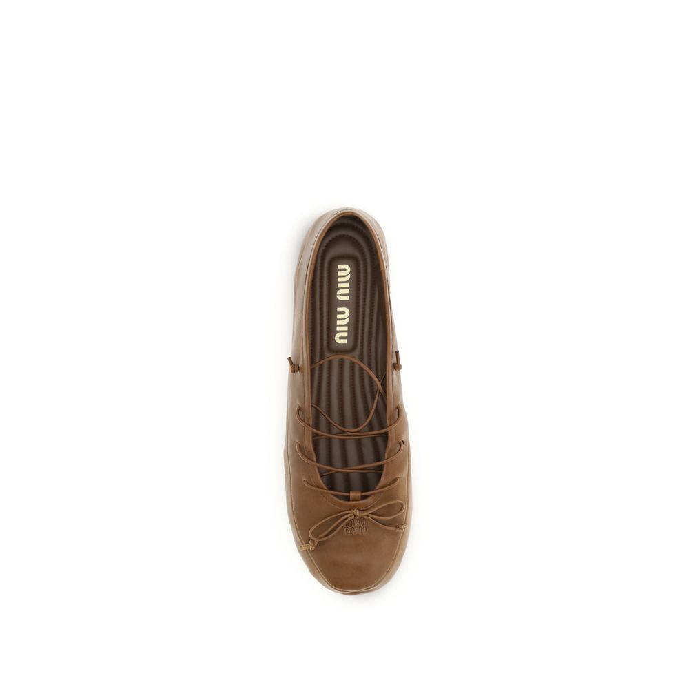 Braune Lammfell-Ballerinas