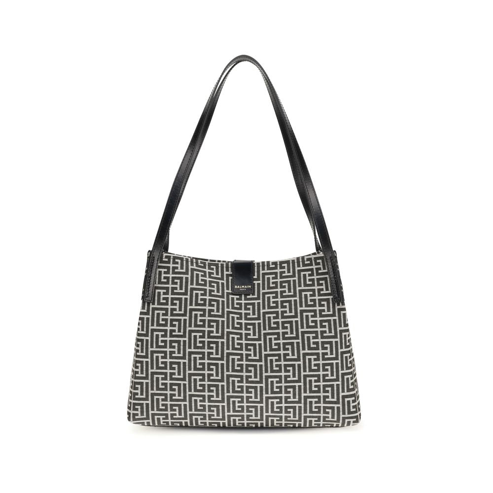 Schwarze Tragetasche aus Baumwolle und Leder mit geometrischem Muster