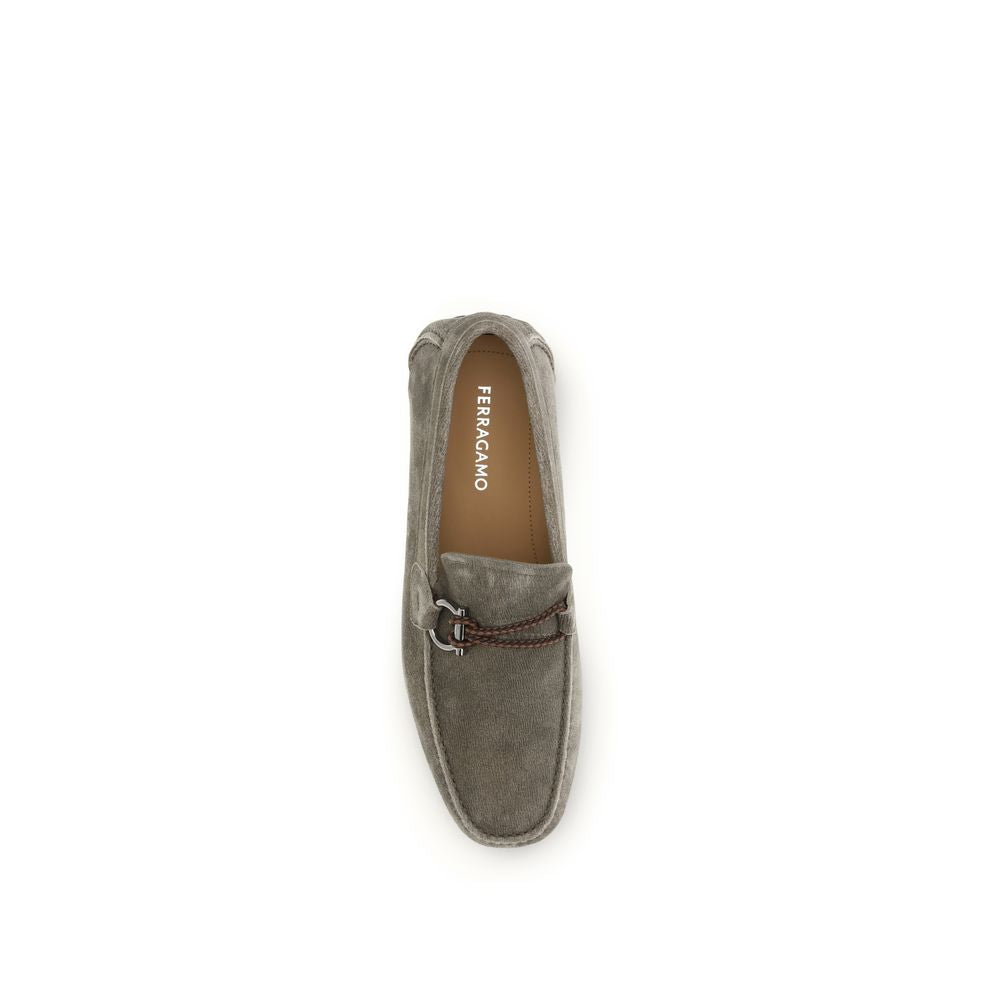 Graue Slipper aus Leder mit Gancini-Detail