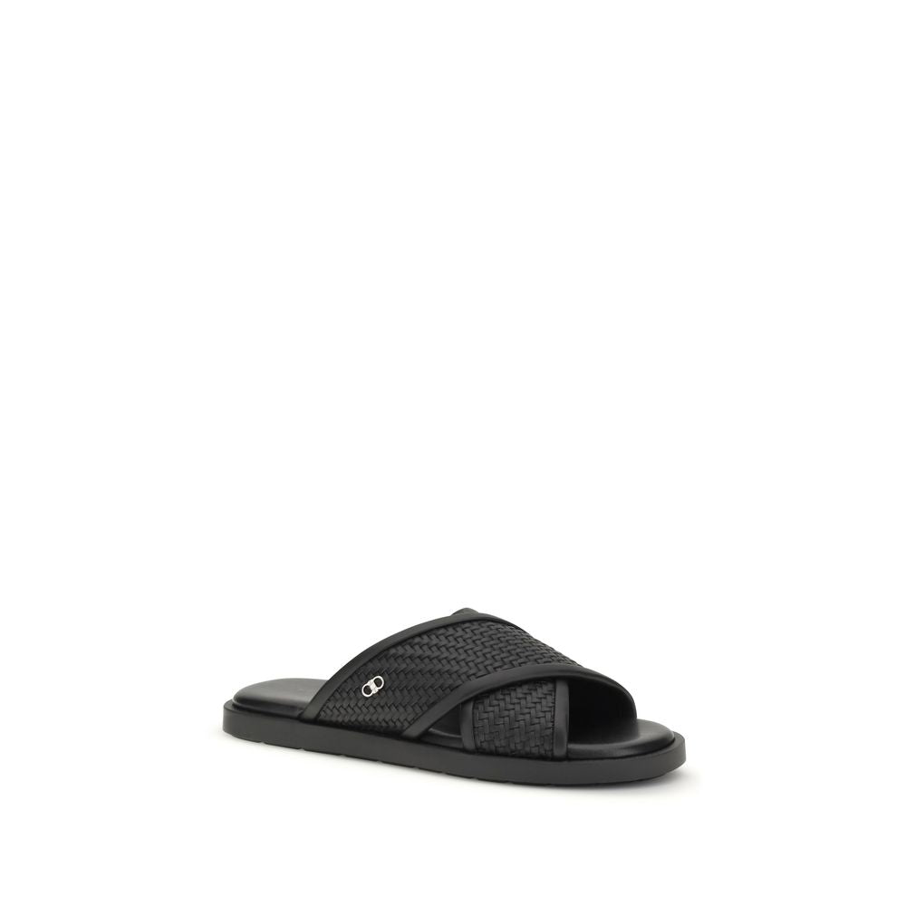 Flache Gancini-Sandalen aus schwarzem Leder