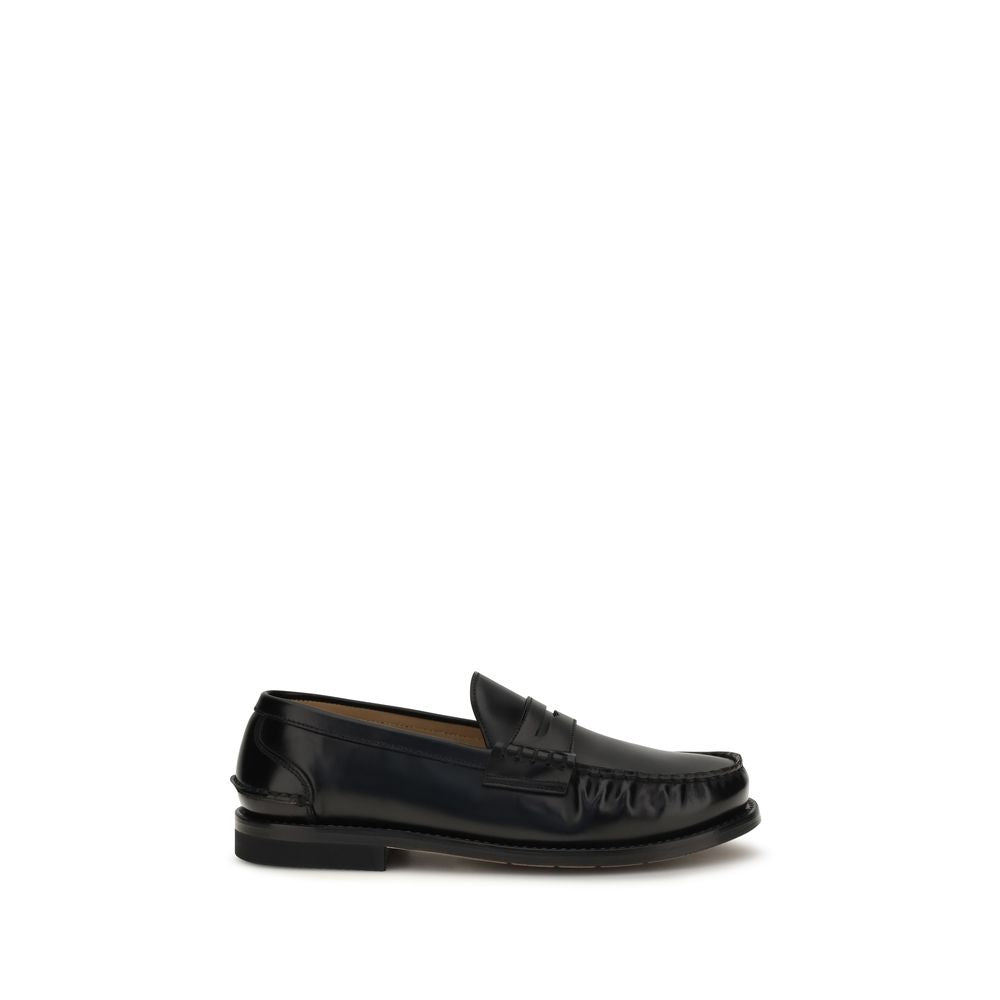 Schwarze Arnold Slipper aus Leder