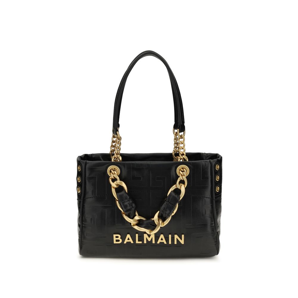 Schwarze Lederschultertasche mit goldfarbenen Beschlägen