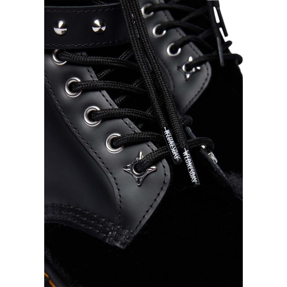 Schwarze Leder-Schnürstiefel mit Schnallenriemen