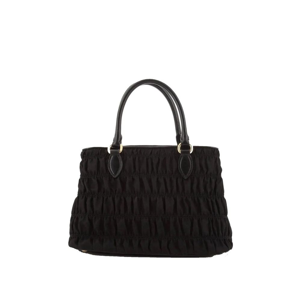 Schwarze Handtasche aus Synthetik mit Lederdetails