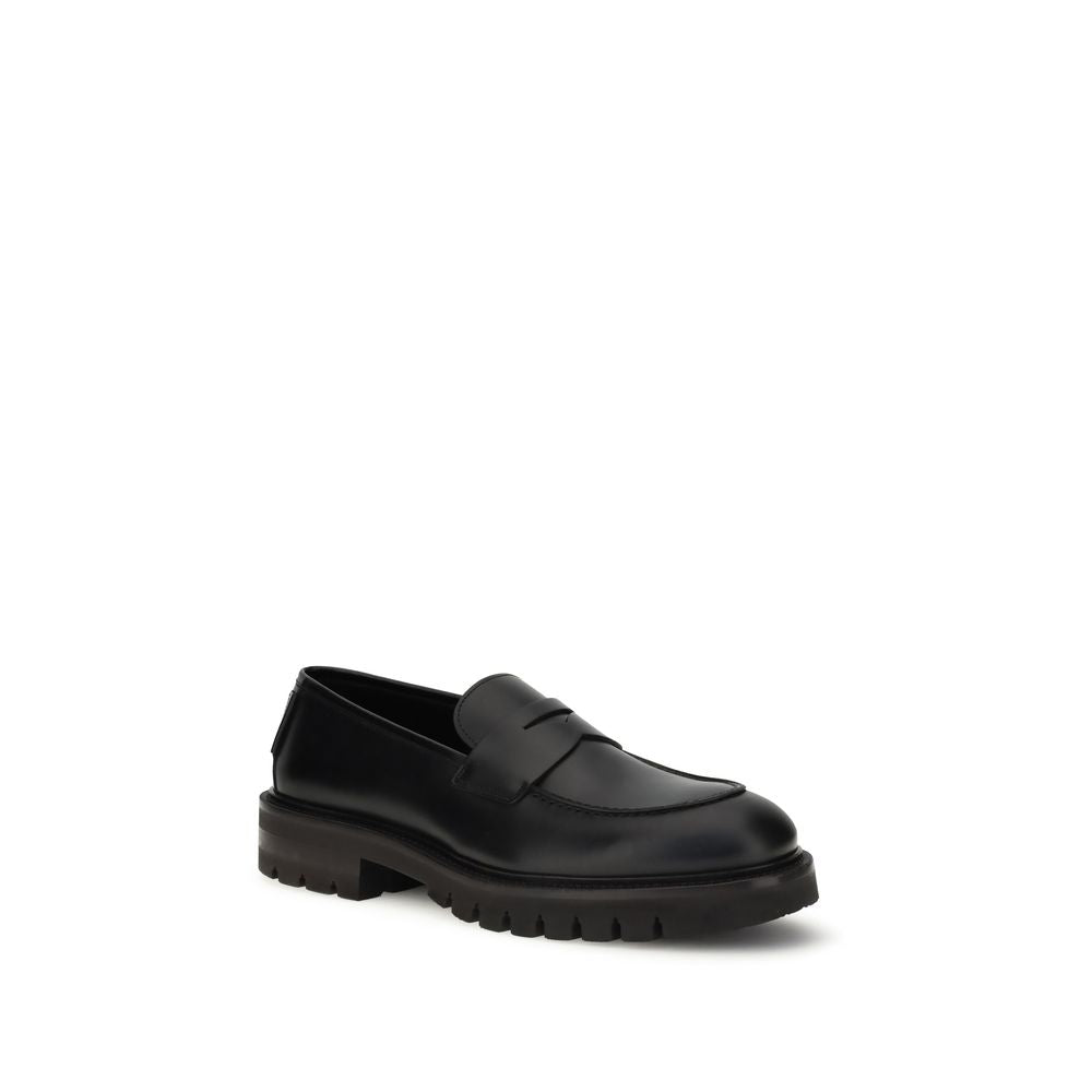 Schwarze Slip-On Loafers aus Leder mit Profilsohle