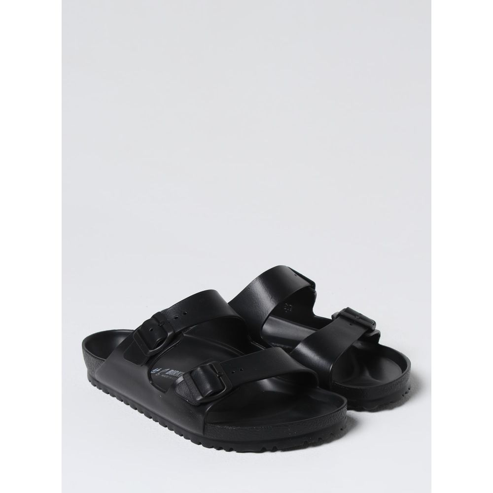 Schwarze flache Synthetik-Sandalen mit verstellbaren Riemen