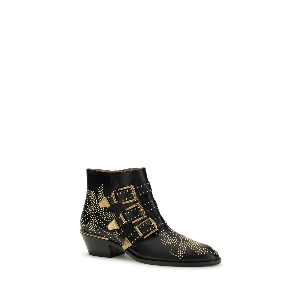 Schwarze Leder Stiefeletten mit Riemen und Nieten
