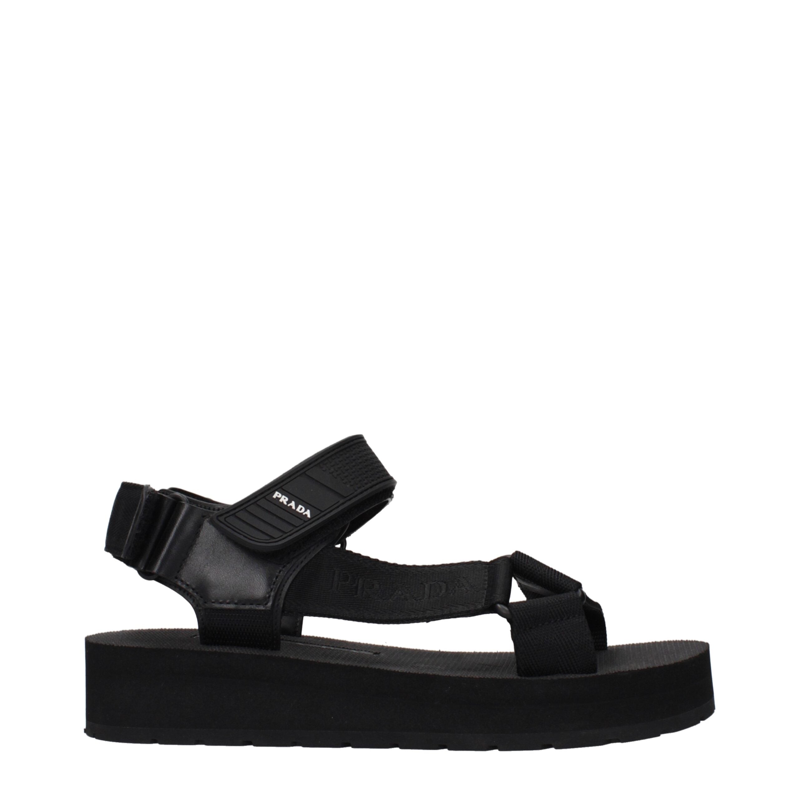 Schwarze synthetische flache Sandalen mit seitlichem Logo von Prada