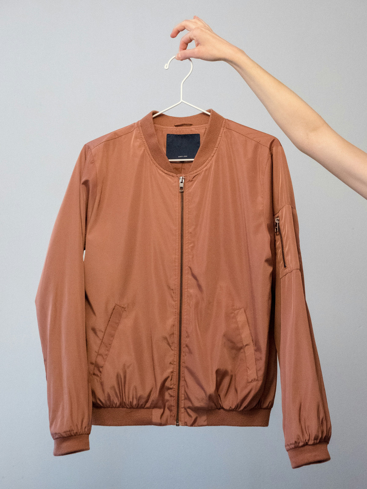 Italian size label IT 48 inside a designer jacket