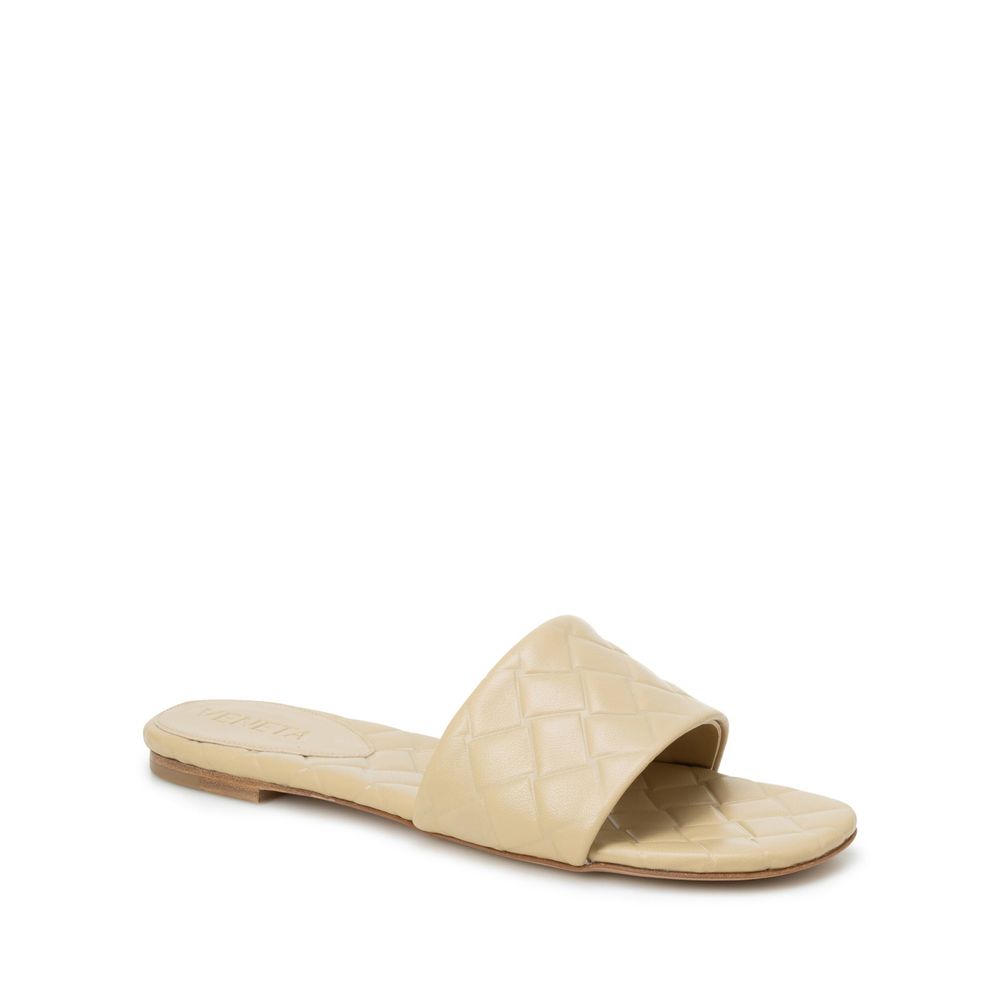 Sandales plates en cuir d'agneau beige