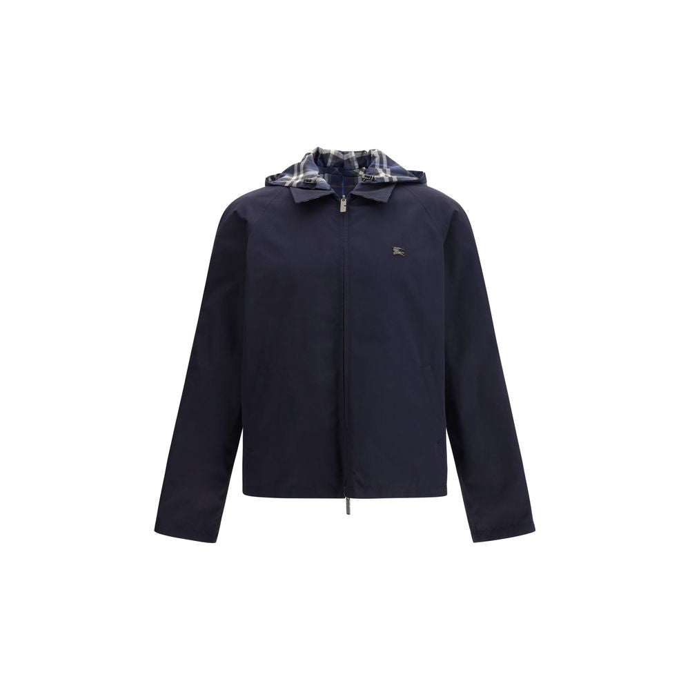 Blaue synthetische Regenjacke mit Kapuze und Wendedesign