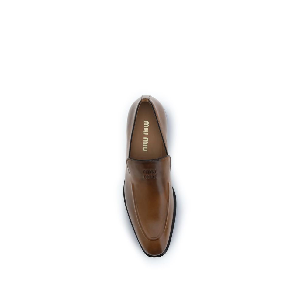 Bos Taurus Slipper aus braunem Kalbsleder