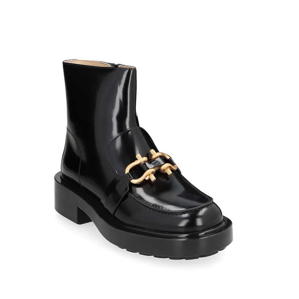 Schwarze Leder-Stiefeletten mit klobiger Sohle