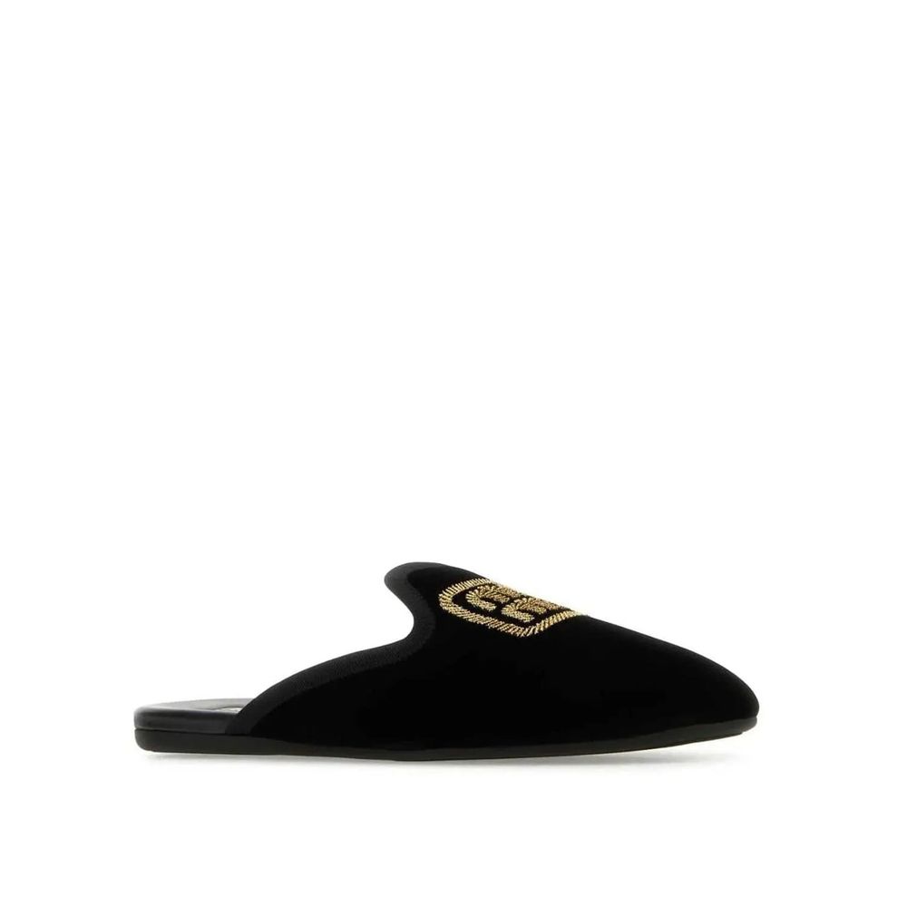 Schwarze Ledermules mit gesticktem Logo
