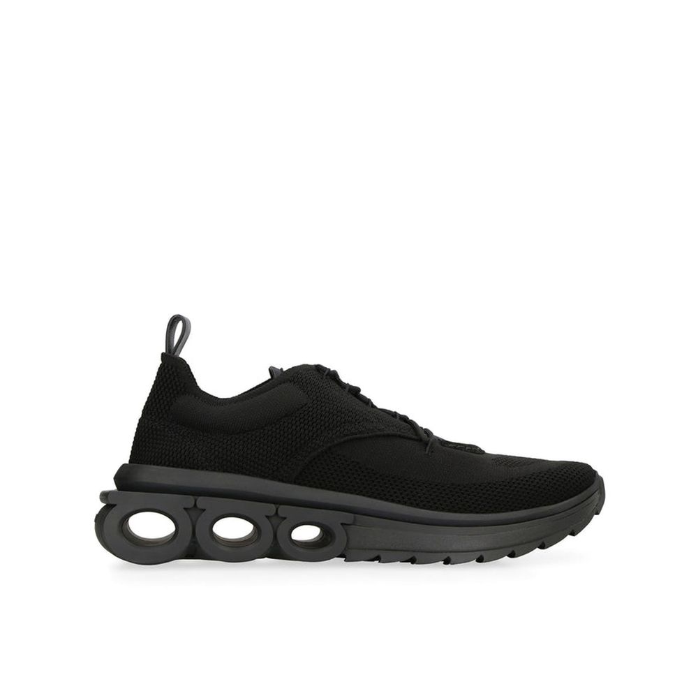 Schwarze synthetische Sportsneaker