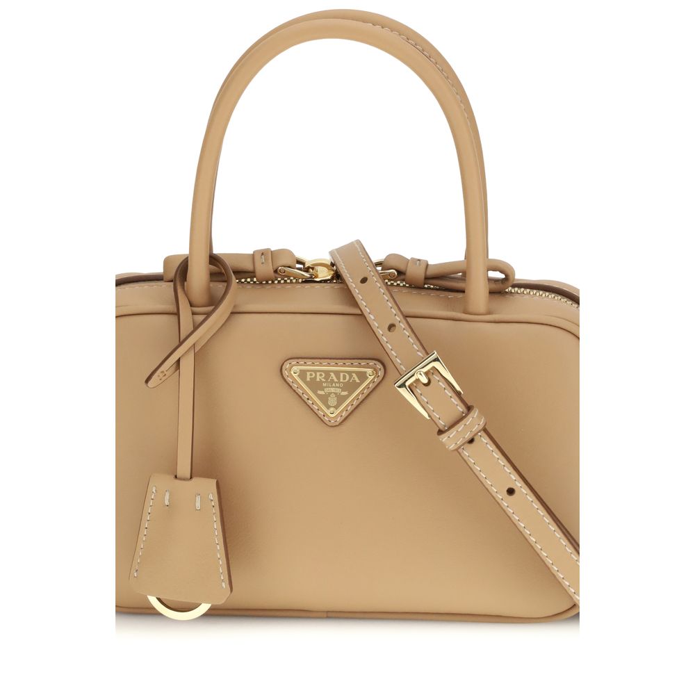 Beige Lederhandtasche mit röhrenförmigen Griffen und Reißverschluss