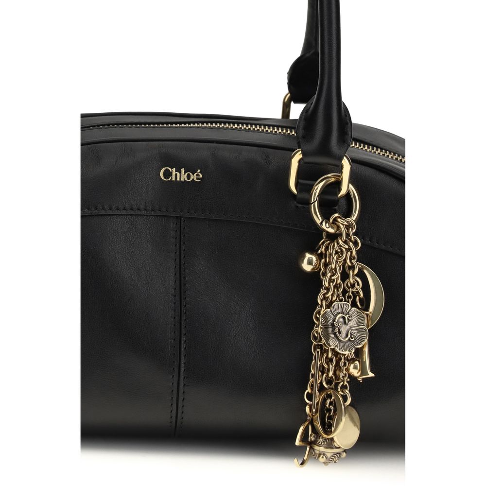 Black Leather Bowling Handbag with Gold Charm by Chloé