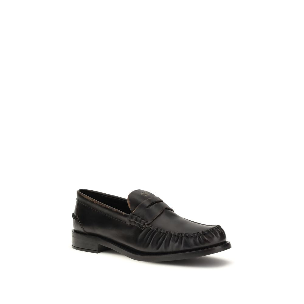 Schwarze Leder-Slipper mit Logo-Detail