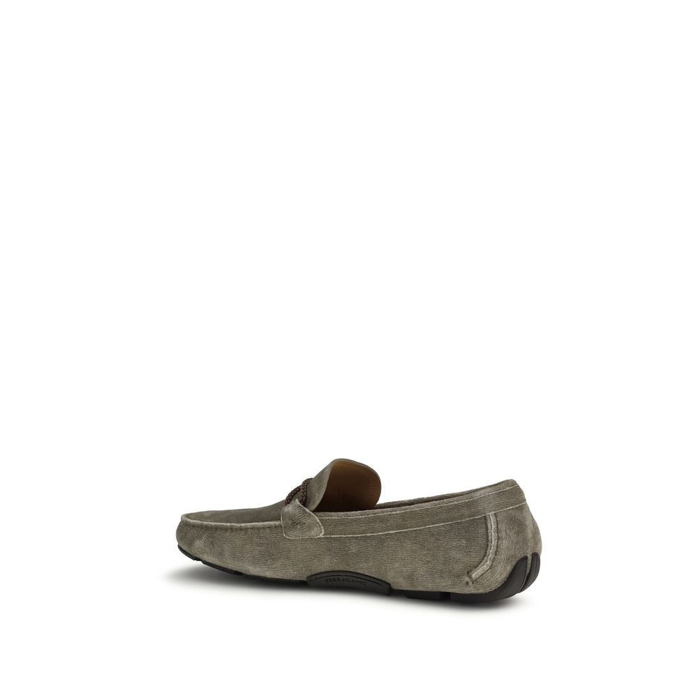 Graue Slipper aus Leder mit Gancini-Detail