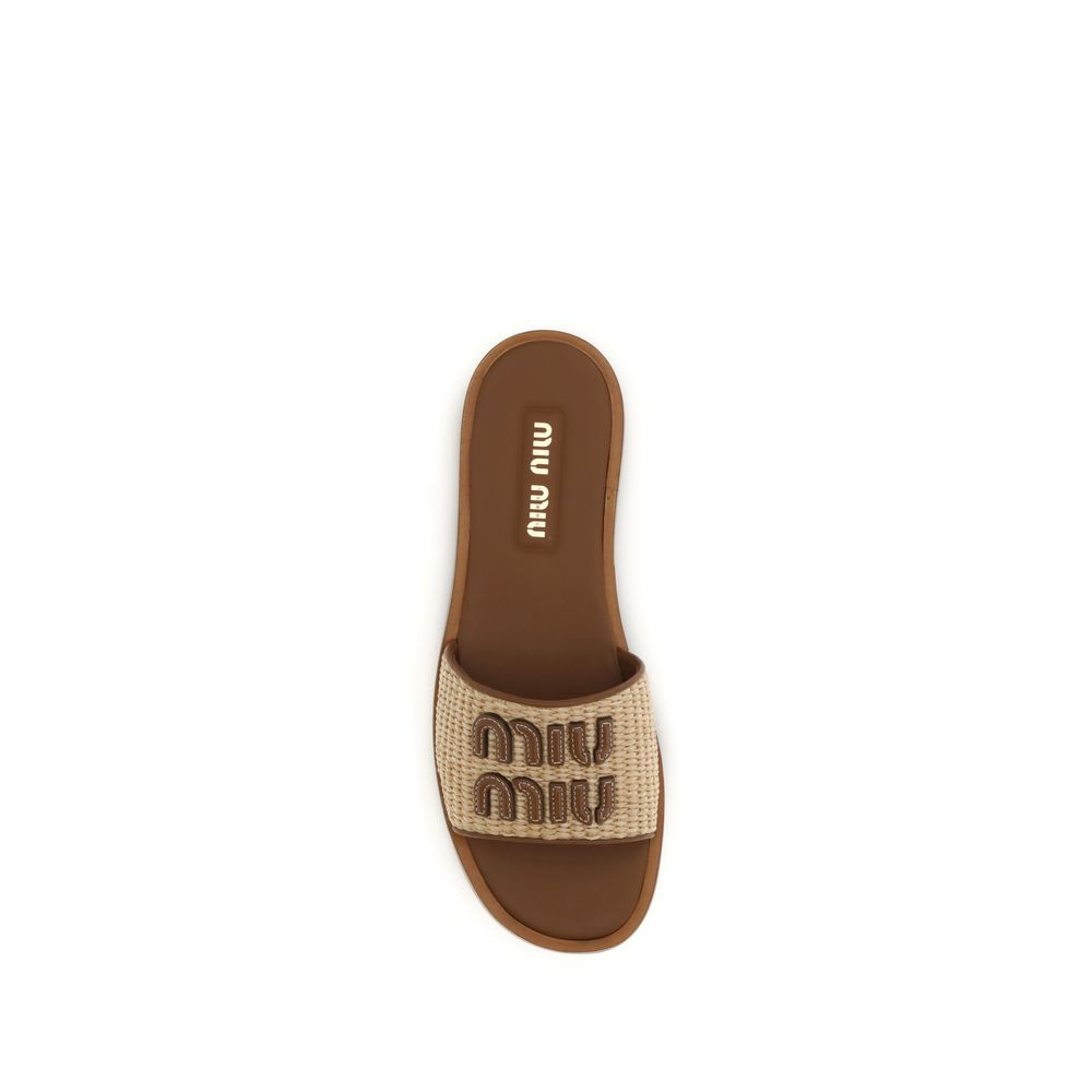Beige Raffia Leather Slippers by Miu Miu