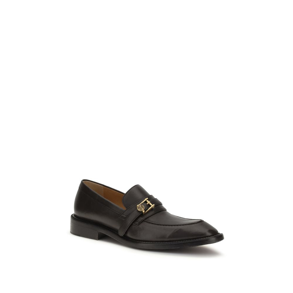 Schwarze Slip-On-Slipper aus Leder mit Medusa-Applikation