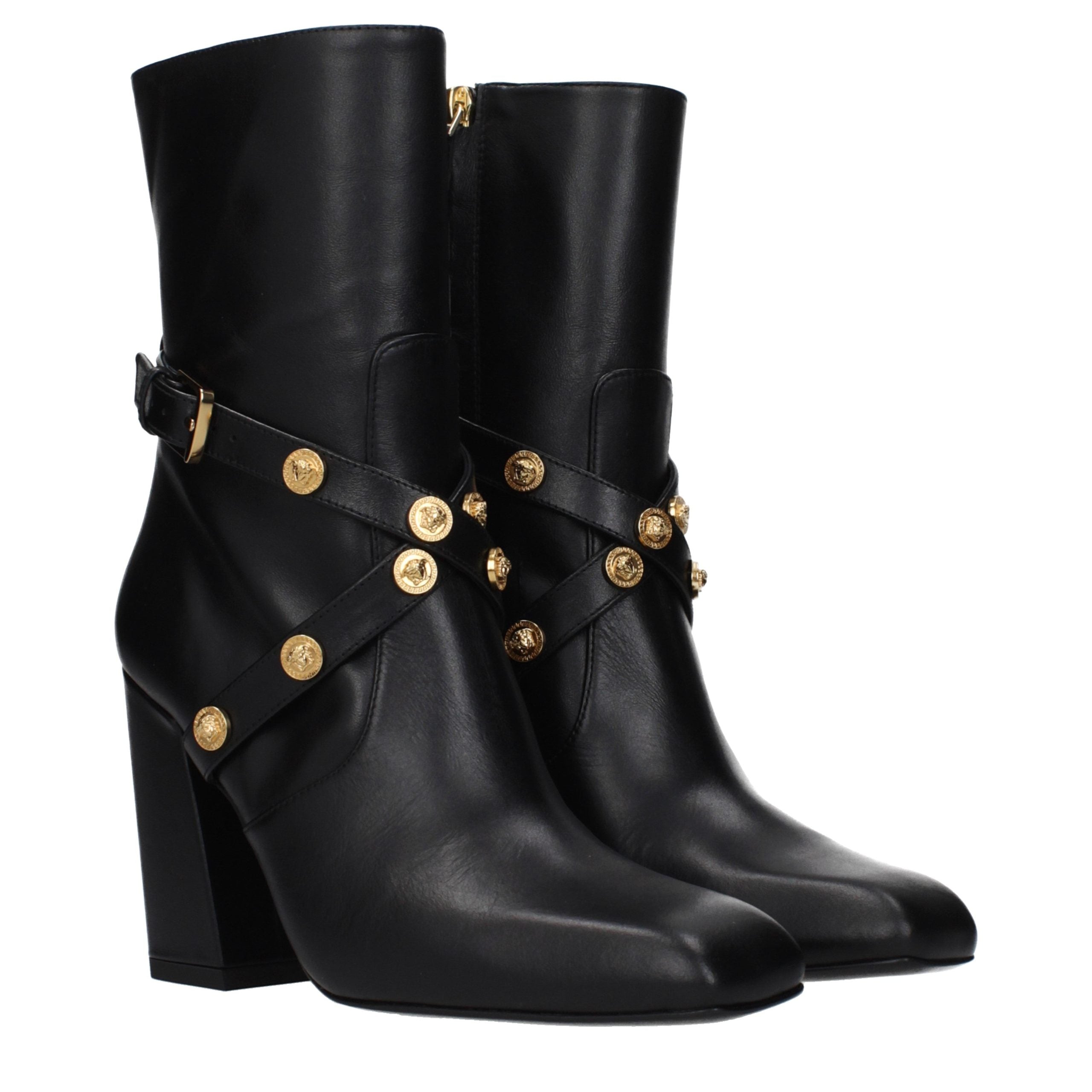 Schwarze Leder-Stiefeletten mit Reißverschluss und hohem Absatz