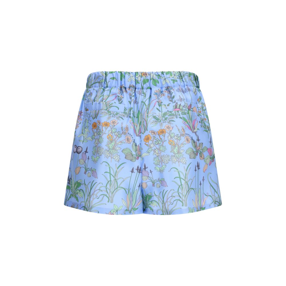 Blaue Seiden-Bermuda-Shorts mit Blumenmuster