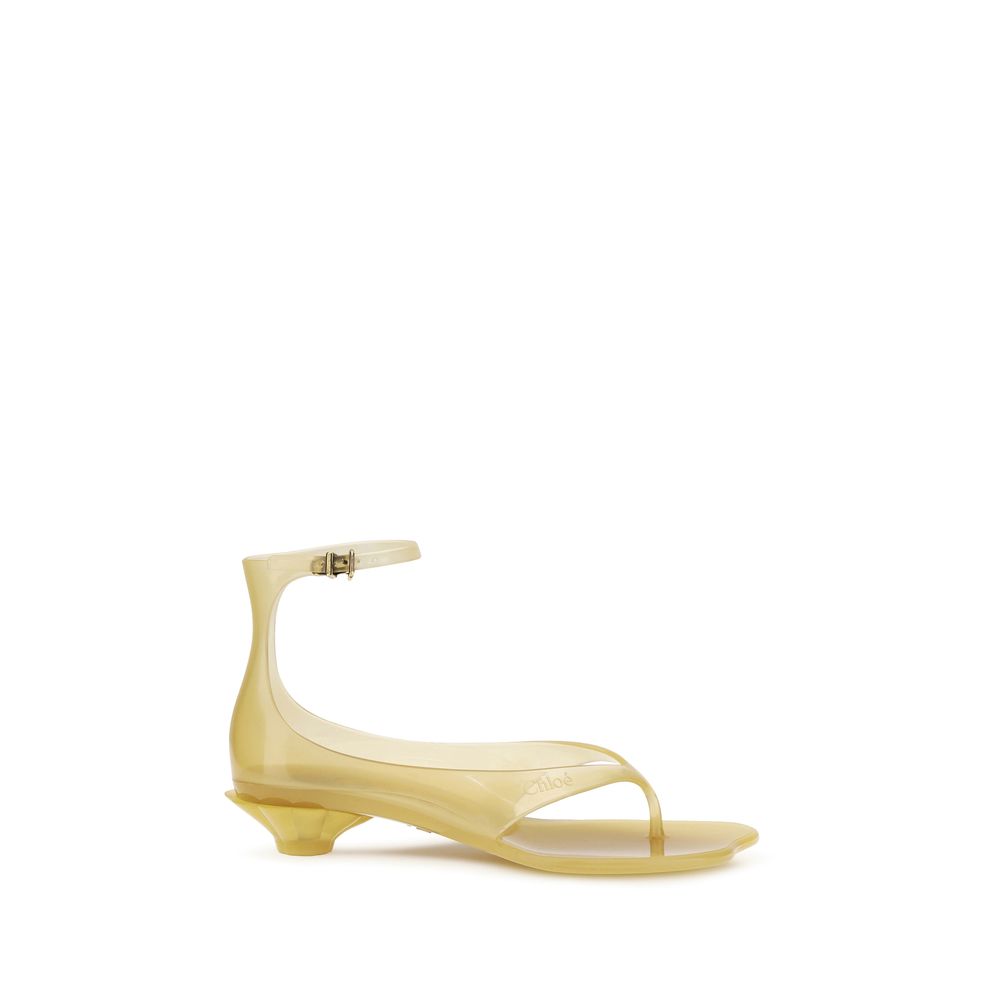 Beigefarbene flache Synthetik-Sandalen mit geprägtem Detail