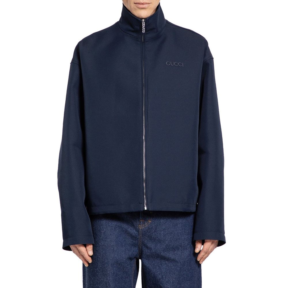 Blauer Wollpullover mit gesticktem Logo