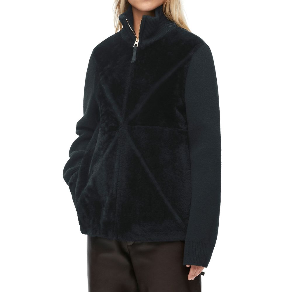 Schwarzer Shearling-Mantel mit hohem Kragen und Reißverschluss
