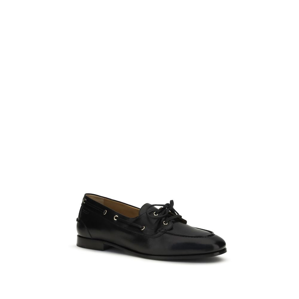 Schwarze Slip-On-Loafer aus Leder mit goldenen Ösen