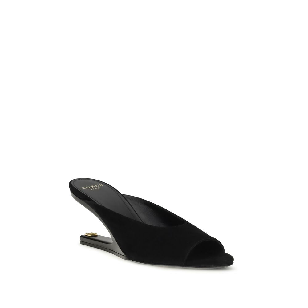 Schwarze Leder-Mules mit geformtem Absatz