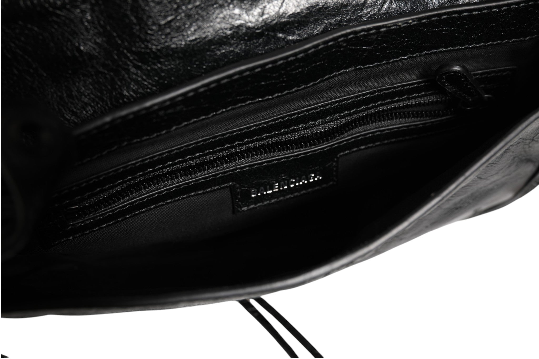 Schwarze Le Cagole XS Leder-Pochette mit Anhänger und Tasche