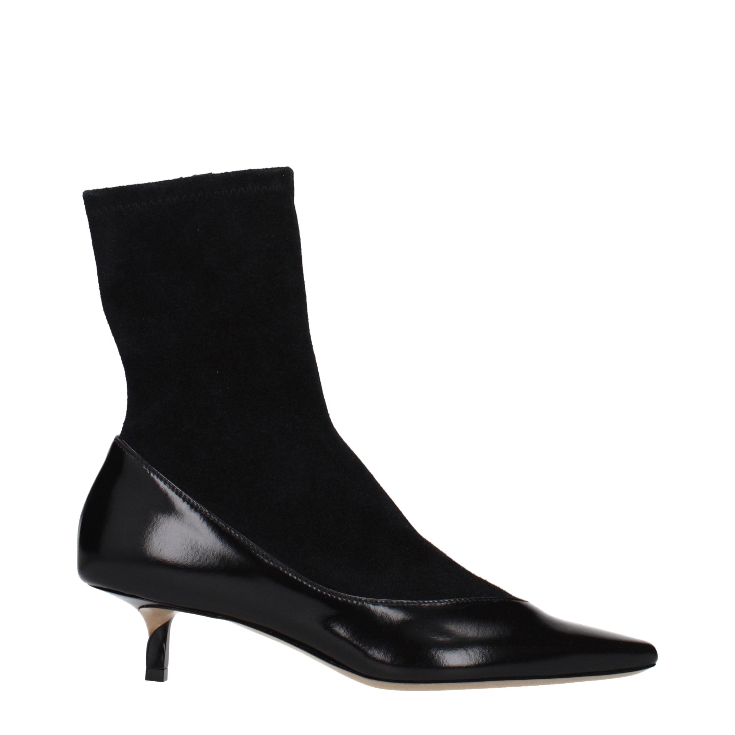 Schwarze Jacquemus Ankle Boots aus Leder mit Vintage-Effekt