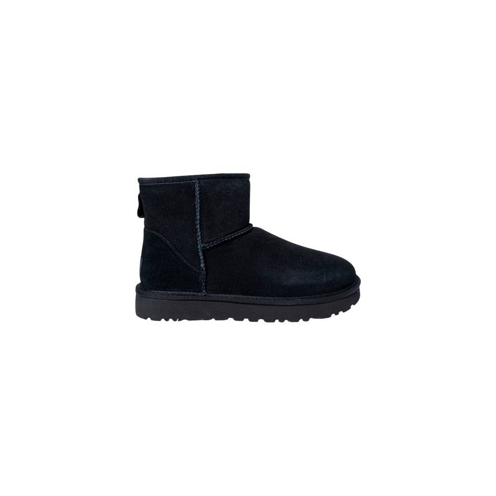 Schwarze Stiefeletten aus Glatt- und Wildleder mit Lammfellsohle