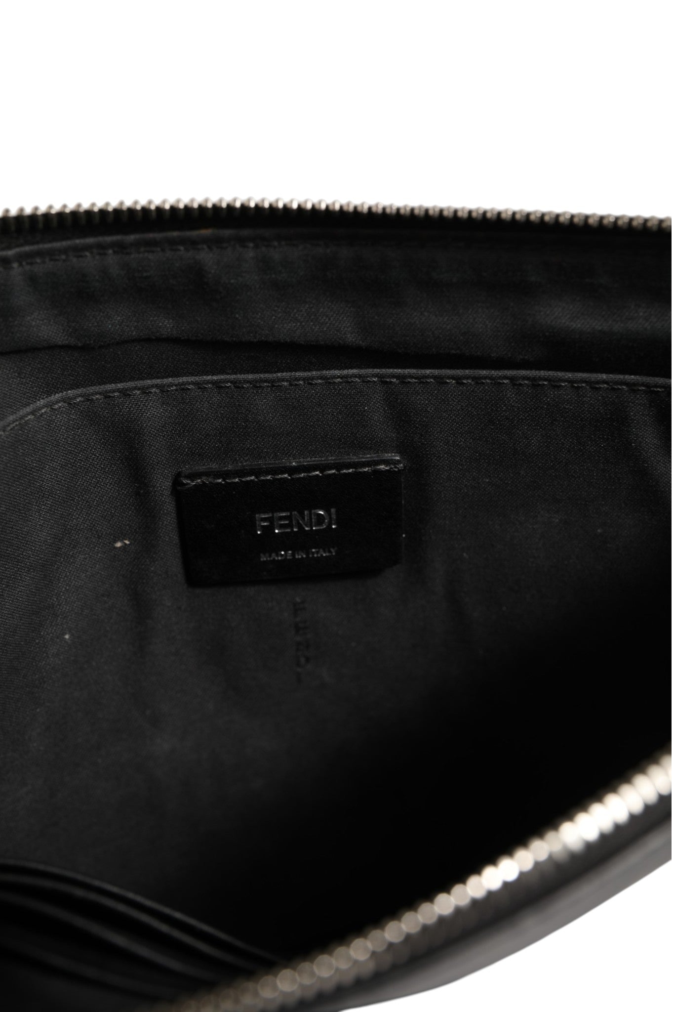 Schwarze Leder-Clutch mit Monsteraugen