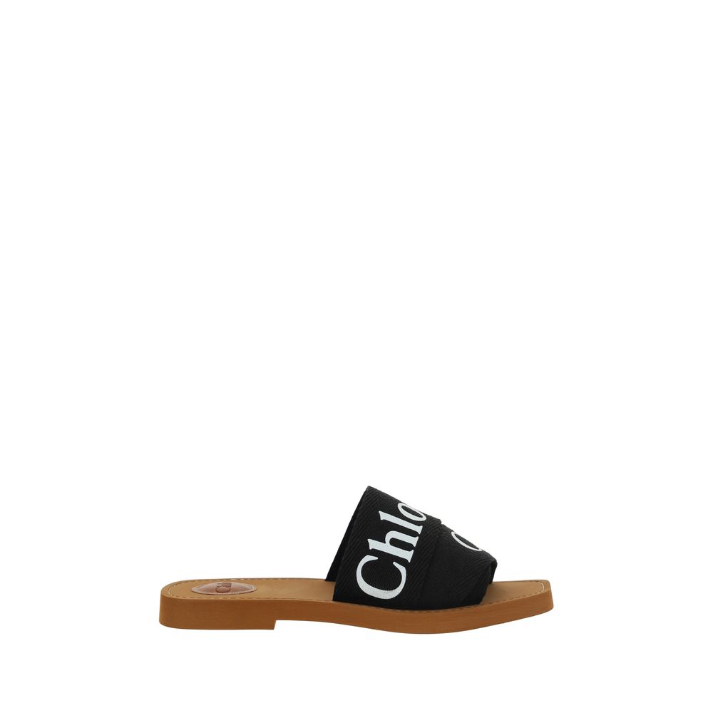 Schwarze flache Sandalen aus Baumwolle mit Logo-Riemen