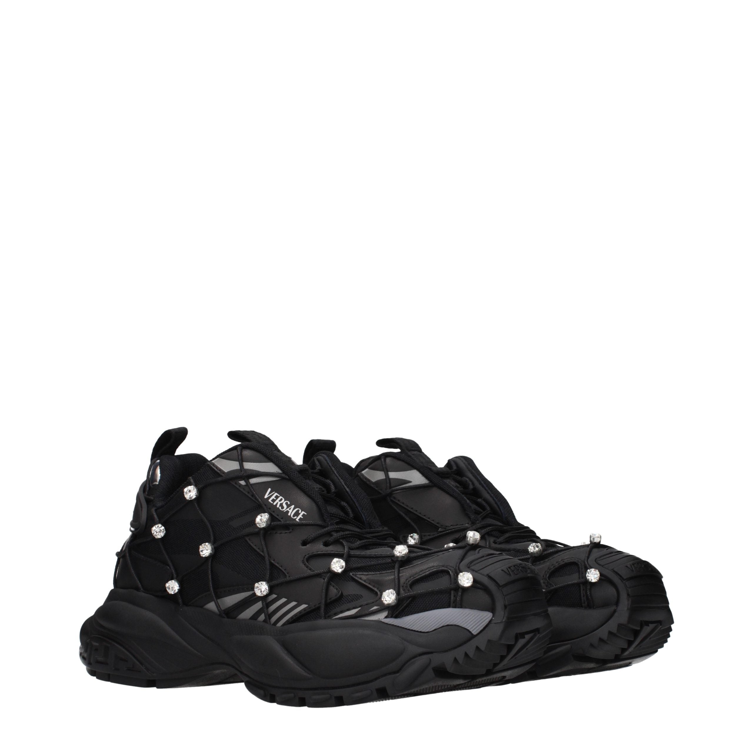 Schwarze klobige Sneakers aus Synthetik mit Logo-Verzierungen