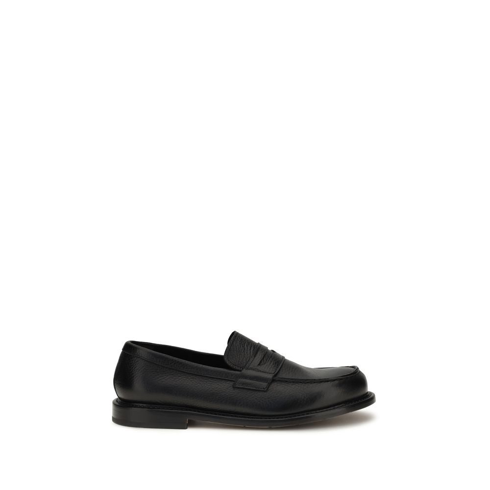 Schwarze Leder-Slipper mit Parabout-Nähten