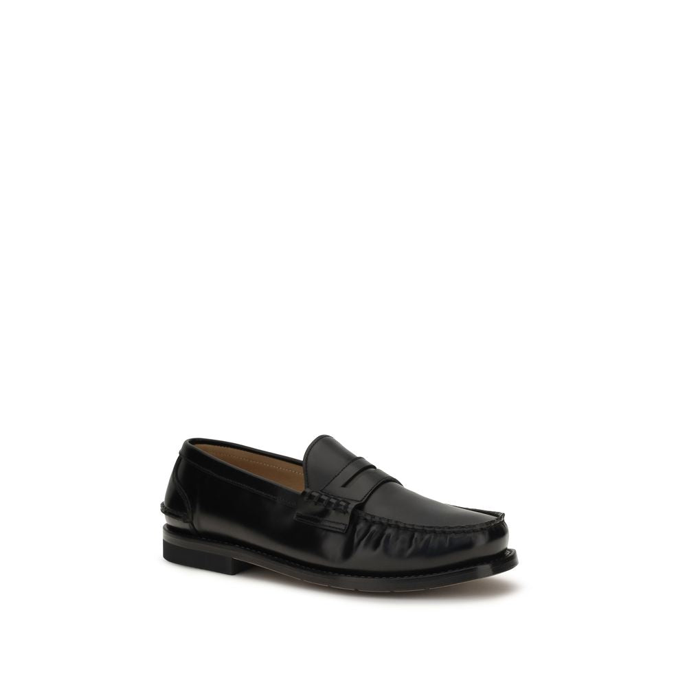 Schwarze Arnold Slipper aus Leder