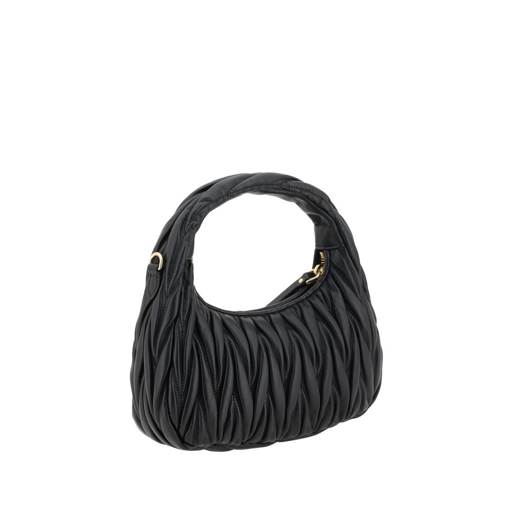 Black Leather Handbag with Quilted Matelassé Design