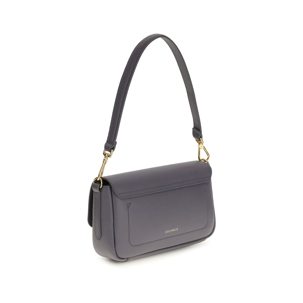 Sac porté épaule Coccinelle en cuir de veau bleu Bos Taurus