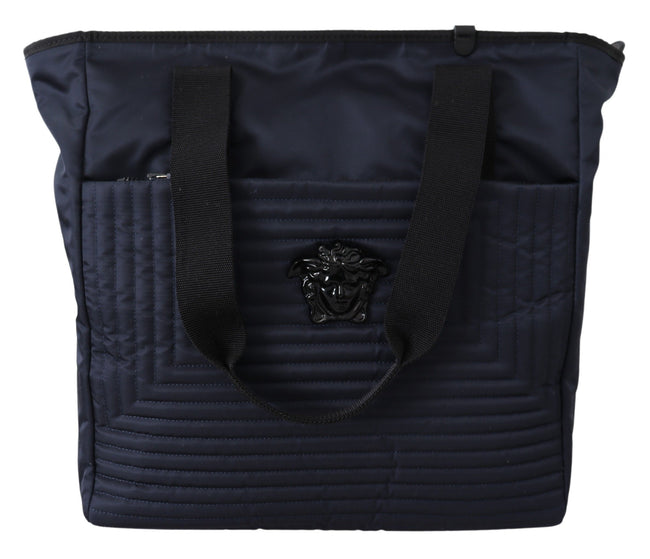 Elegant Blue Nylon Tote BagStep out in style with this stunning, 100% Authentic Versace Nylon Tote Bag, perfect for adding a touch of elegance to any look. With its sleek blue hue and premium nylon construction, this tote is not just a statement accessory