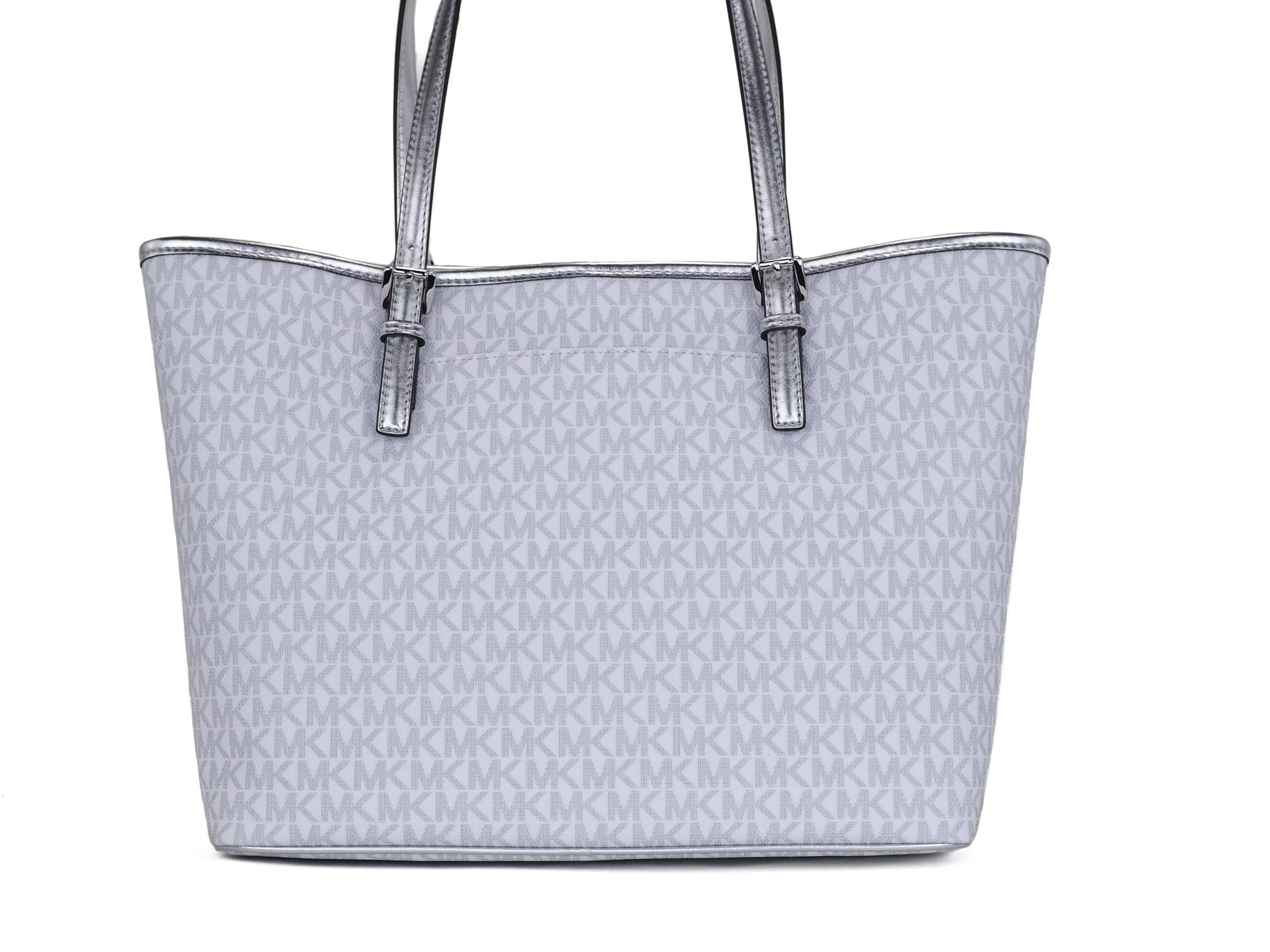 Jet Set Girls Print Medium Signature PVC Carryall Shoulder Tote Handbag (Bright White Multi)Brand New with Tags Attached (100% Authentic) Style: Michael Kors Jet Set Girls Print Medium Signature PVC Carryall Shoulder Tote Bag (Bright White Multi) Material