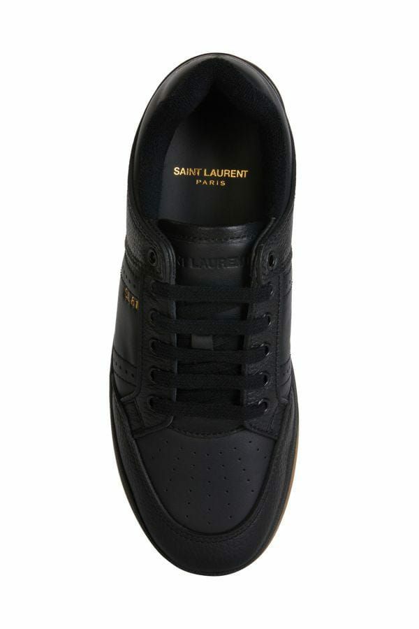 Elegant Black Low-Top Leather SneakersStep into luxury and style with these sleek black low-top sneakers from Saint Laurent, perfect for accenting your street-style ensemble with a touch of sophistication. Crafted with high-quality calf leather and featur