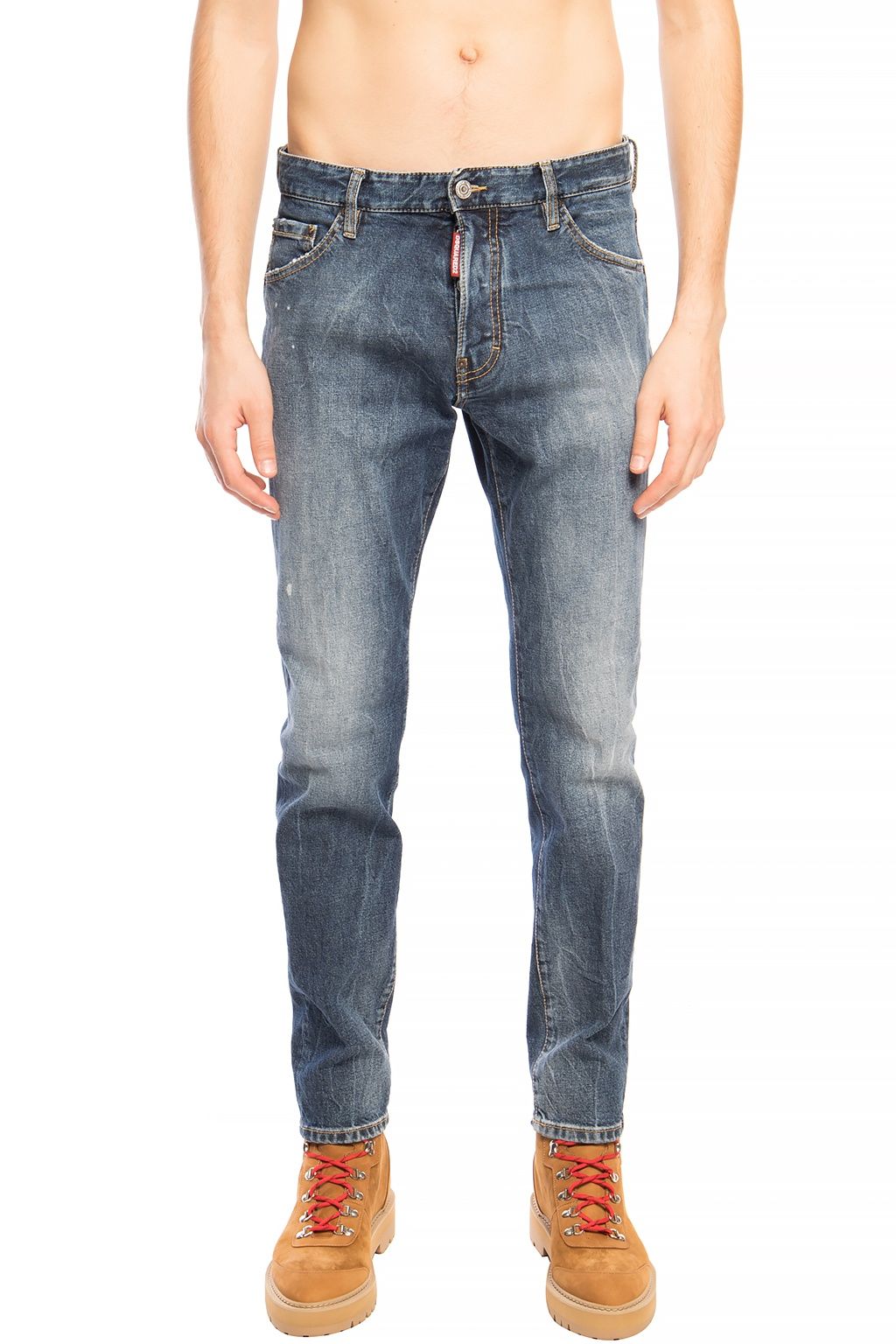 Blue Cotton Men JeansElevate your denim game with the distinctive flair of Dsquared²’s Navy ‘Cool Guy Jean’. These premium jeans boast a bold distressed design, ideal for the fashion-forward individual. Their tapered legs are finished with a raw edge, add