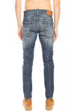 Blue Cotton Men JeansElevate your denim game with the distinctive flair of Dsquared²’s Navy ‘Cool Guy Jean’. These premium jeans boast a bold distressed design, ideal for the fashion-forward individual. Their tapered legs are finished with a raw edge, add