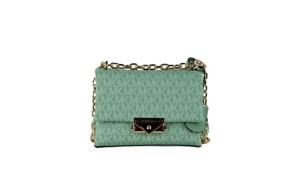 Cece Small Sea Green Signature PVC Convertible Flap Crossbody BagStyle: Michael Kors Cece Small Convertible Flap Crossbody Shoulder Bag (Sea Green Multi) Material: Signature PVC and Smooth Leather Features: Adjustable Chain/Leather Strap (Crossbody or Sho